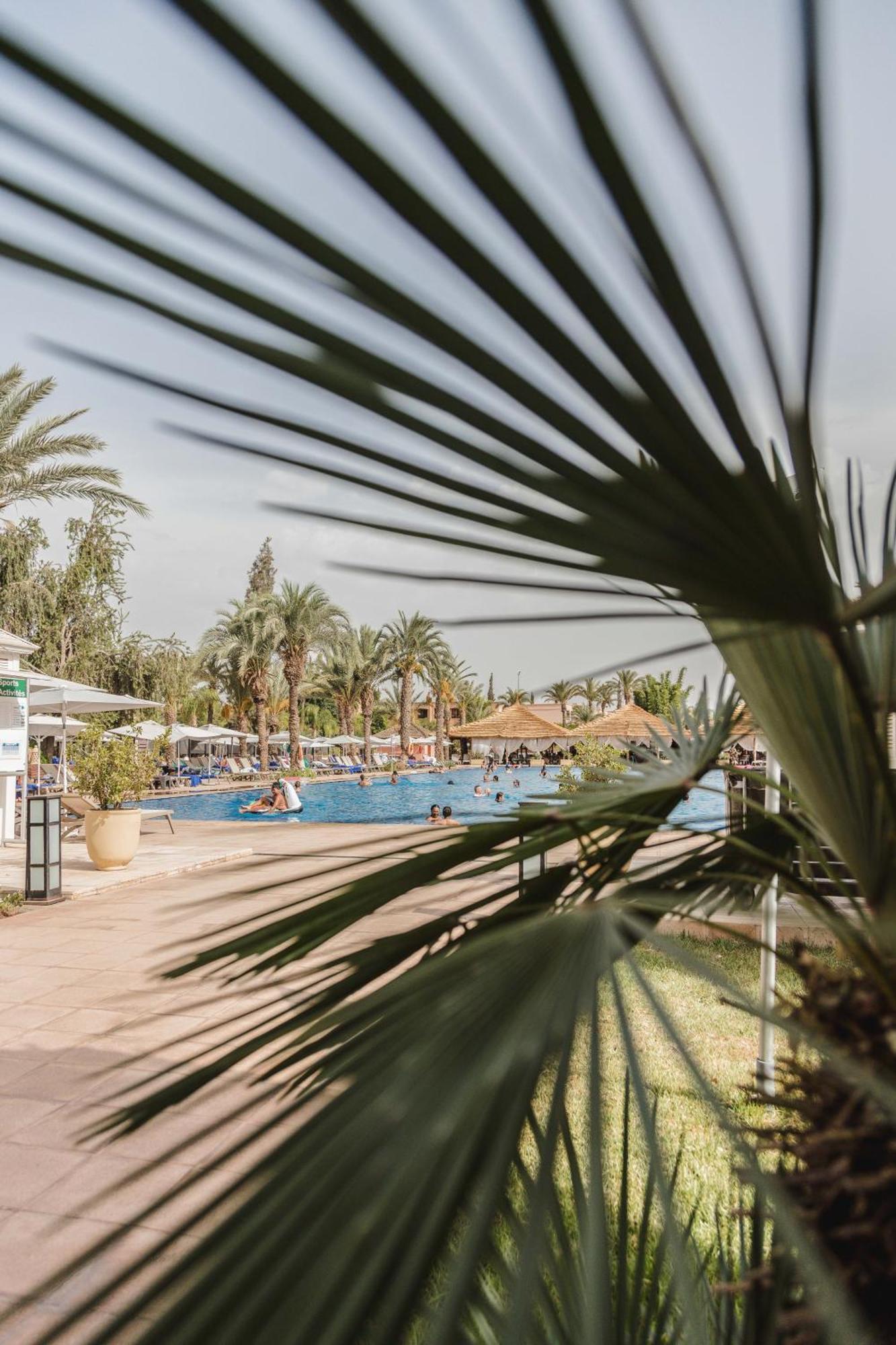 Kenzi Menara Palace & Resort Маракеш Екстериор снимка A swimming pool in a hotel in Tunisia
