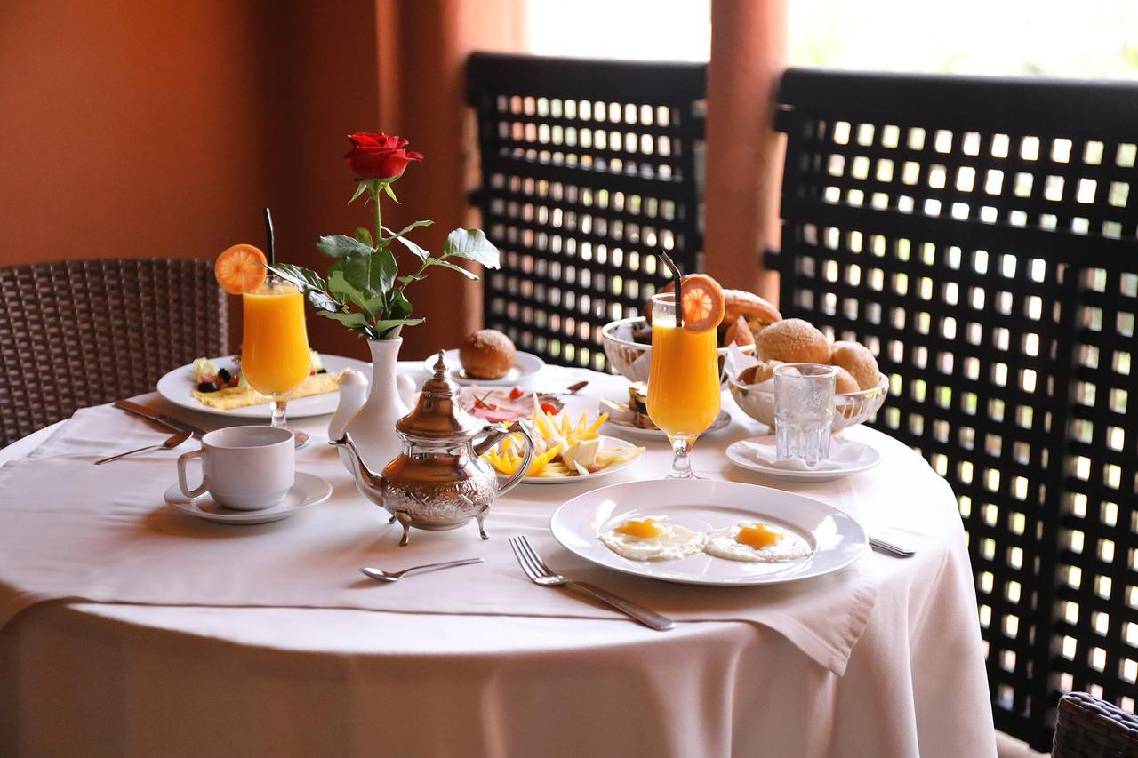 Kenzi Menara Palace & Resort Маракеш Екстериор снимка A breakfast table